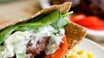 Goat Cheese-Stuffed Burger with Tangy Goat Cheese-Cucumber Dressing Goat Cheese-Stuffed Burger with Tangy Goat Cheese-Cucumber Dressing