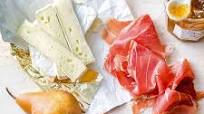 Prosciutto, Pear, and Brie Toasts Prosciutto, Pear, and Brie Toasts