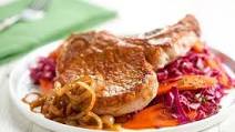 German Beer Garden Pork Chop with apple braised carrots and red cabbage German Beer Garden Pork Chop with apple braised carrots and red cabbage
