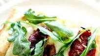 Focaccia Pizza with Sun-dried Tomatoes and Arugula Focaccia Pizza with Sun-dried Tomatoes and Arugula