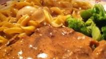 CENTER CUT PORK CHOPS AND NOODLES WITH MUSHROOM GRAVY AND BROCCOLI IN GARLIC BUTTER CENTER CUT PORK CHOPS AND NOODLES WITH MUSHROOM GRAVY AND BROCCOLI IN GARLIC BUTTER
