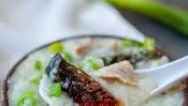 Congee with pork and century egg Congee with pork and century egg