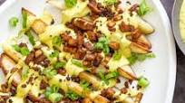 Baked Potato Wedges with Creamy Cheese Sauce and Tofu Bacony Bits Baked Potato Wedges with Creamy Cheese Sauce and Tofu Bacony Bits