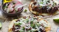 Puffy Tostadas with Chile and Beer Braised Short Rib and Tomatilla Salsa Puffy Tostadas with Chile and Beer Braised Short Rib and Tomatilla Salsa