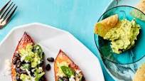 Stuffed Sweet Potatoes with Black Beans, Spinach, and Guacamole Stuffed Sweet Potatoes with Black Beans, Spinach, and Guacamole