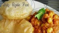 Jain chole puri ( chick-pea curry with fried puffed whole wheat flat bread ) Jain chole puri ( chick-pea curry with fried puffed whole wheat flat bread )