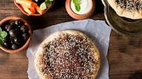 Manakish Zaatar (Traditional Lebanese Spiced Pita Bread) Manakish Zaatar (Traditional Lebanese Spiced Pita Bread)