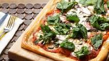 Greek Pizza with Kalamata Olives, Feta & Pea Tips Greek Pizza with Kalamata Olives, Feta & Pea Tips