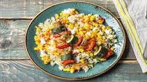 Vibrant Veggie Skewers Over Herbed Couscous with a Corn Feta Relish Vibrant Veggie Skewers Over Herbed Couscous with a Corn Feta Relish