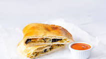 Aubergine & Pesto Calzones With Roasted Cherry Tomato Sauce Aubergine & Pesto Calzones With Roasted Cherry Tomato Sauce