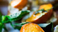 Peach Bruschetta with goat cheese, basil and infused honey Peach Bruschetta with goat cheese, basil and infused honey