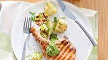 Grilled pork cutlets with rocket and almond pesto Grilled pork cutlets with rocket and almond pesto