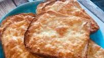 Pan tostado al horno con huevos y queso Pan tostado al horno con huevos y queso