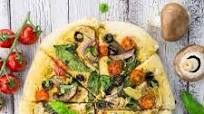 Hummus Pizza with Veggies Hummus Pizza with Veggies