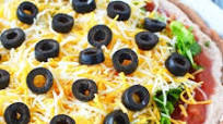 Layered Taco dip with Refried Beans Layered Taco dip with Refried Beans