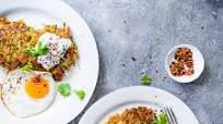 Curried halloumi fritters, raita and fried egg Curried halloumi fritters, raita and fried egg