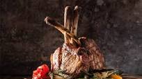 Grilled pork tomahawk with vegetables Grilled pork tomahawk with vegetables