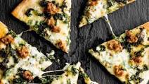 Thin-crust pizza with sausage and kale Thin-crust pizza with sausage and kale