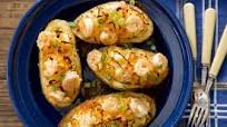 Rich and Cheesy Shrimp-Stuffed Baked Potatoes Rich and Cheesy Shrimp-Stuffed Baked Potatoes