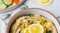 CREAMY ROASTED GARLIC AND LEMON HUMMUS CREAMY ROASTED GARLIC AND LEMON HUMMUS