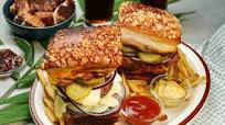 Lechón Burger - Filipino roasted suckling pig and beef patty sandwich Lechón Burger - Filipino roasted suckling pig and beef patty sandwich
