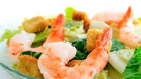 Caesar salad with cooked prawns Caesar salad with cooked prawns