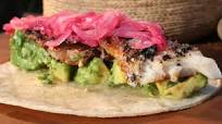 Crisp sea bass tacos with pink pickled onion Crisp sea bass tacos with pink pickled onion