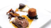 Pork cooked three ways with cauliflower purée, Swiss chard and Ravigôte sauce Pork cooked three ways with cauliflower purée, Swiss chard and Ravigôte sauce