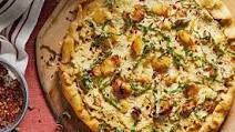 Vegan White Pizza With Artichoke Tofu Ricotta and Roasted Garlic Vegan White Pizza With Artichoke Tofu Ricotta and Roasted Garlic