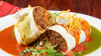 Christmas-Style Beef Burrito With Red and Green Chile Sauces Christmas-Style Beef Burrito With Red and Green Chile Sauces
