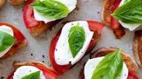 Tomato, Basil, Mozzarella Bruschetta with Pesto Tomato, Basil, Mozzarella Bruschetta with Pesto