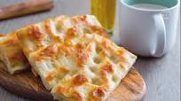 Focaccia (fügassa) alla genovese Focaccia (fügassa) alla genovese