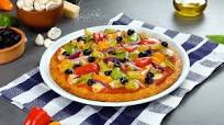 Pizza baja en carbohidratos: la masa de pizza hecha con coliflor lo hace posible Pizza baja en carbohidratos: la masa de pizza hecha con coliflor lo hace posible