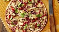 Mediterranean chicken pizza with basil Mediterranean chicken pizza with basil