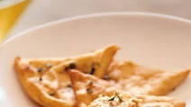 White Four-Cheese Pizza with Basil and Garlic White Four-Cheese Pizza with Basil and Garlic
