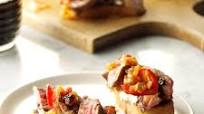 Steak & Blue Cheese Bruschetta with Onion & Roasted Tomato Jam Steak & Blue Cheese Bruschetta with Onion & Roasted Tomato Jam