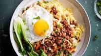Asian beef mince noodle bowl with fried egg Asian beef mince noodle bowl with fried egg