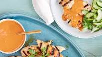 Chicken satay with peanut sauce and cucumber salad Chicken satay with peanut sauce and cucumber salad