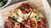 Pizza With Frozen Premade Pizza Crust Recipe | Sip Bite Go Pizza With Frozen Premade Pizza Crust Recipe | Sip Bite Go