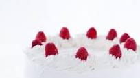 Coconut Raspberry Cake with Whipped Cream Frosting Coconut Raspberry Cake with Whipped Cream Frosting