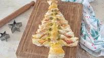 Albero di Natale di pasta sfoglia: la ricetta perfetta per la tavola delle feste Albero di Natale di pasta sfoglia: la ricetta perfetta per la tavola delle feste