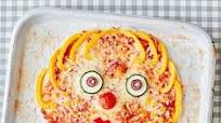 Toddler recipe: homemade pizza with veggie faces Toddler recipe: homemade pizza with veggie faces