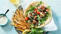 Take-Out Style: Falafel Gyro & Oven Fries with Lemon Tahini & Arugula Take-Out Style: Falafel Gyro & Oven Fries with Lemon Tahini & Arugula