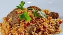 Giouvetsi- Gravy Beef in tomato sauce with orzo Giouvetsi- Gravy Beef in tomato sauce with orzo