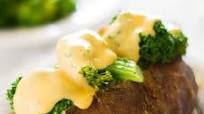Slow Cooker Baked Potatoes With Broccoli and Cheese Sauce Slow Cooker Baked Potatoes With Broccoli and Cheese Sauce