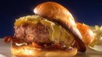 The Alabama Smokehouse Pig Burger with White Barbecue Sauce The Alabama Smokehouse Pig Burger with White Barbecue Sauce
