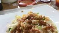 Tostadas de Manitas de Cerdo deshuesada al estilo Sonorense Tostadas de Manitas de Cerdo deshuesada al estilo Sonorense