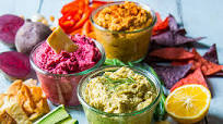 Multi-coloured hummus trio Multi-coloured hummus trio