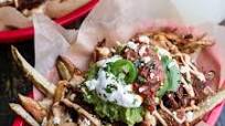 Tijuana Street Fries (Honey Glazed Chipotle Carnitas, Fries + Toppings) Tijuana Street Fries (Honey Glazed Chipotle Carnitas, Fries + Toppings)