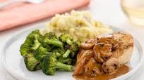 Chicken with Peppercorn-Mushroom Gravy and truffle mashed potatoes Chicken with Peppercorn-Mushroom Gravy and truffle mashed potatoes